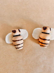 Handcrafted wooden bees with felt wings (3cm), a limited-edition piece for whimsical decor or creative play.