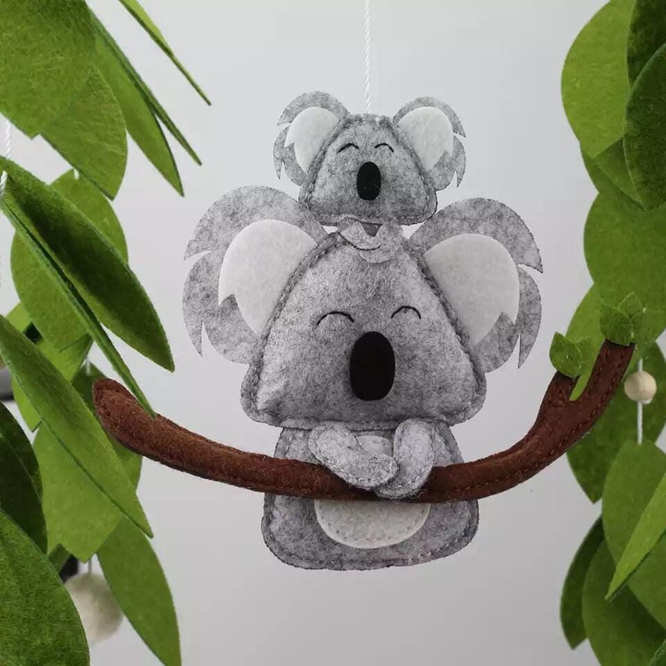 Handcrafted koala baby mobile with an Australian theme, a unique nursery decor piece for newborns.