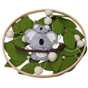 Handcrafted koala baby mobile with an Australian theme, a unique nursery decor piece for newborns.
