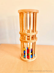 Wooden rainmaker toy in two sizes, a magical sensory and musical toy for kids.